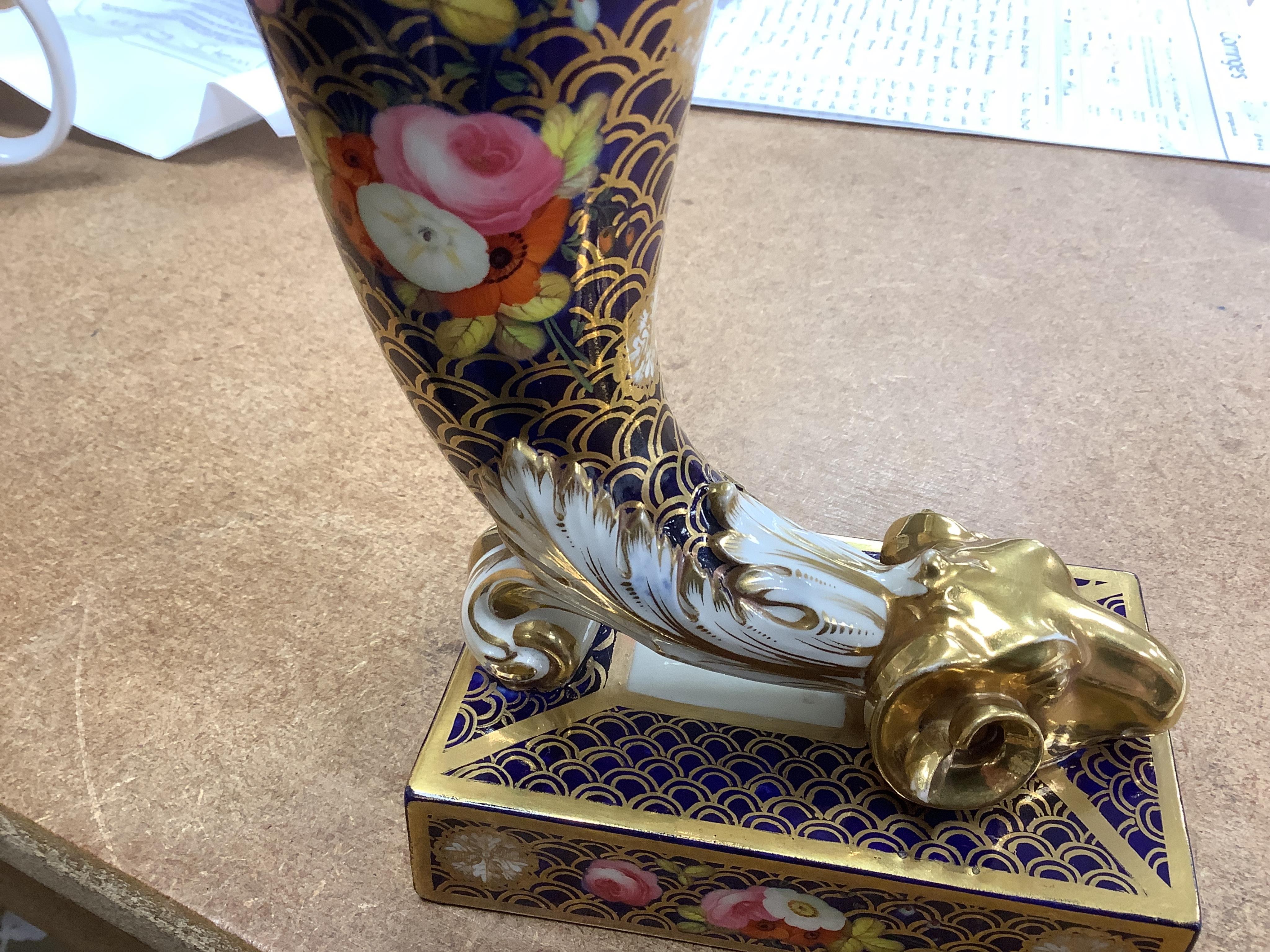 A pair of Spode-type cornucopia vases, 18cm high (a.f.). Condition - restored